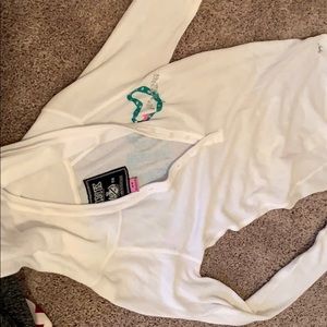 A pink shirt or sweater or throw